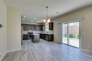 Kitchen featuring stainless steel appliances, ligh