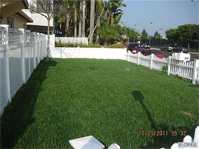Front Grassy Fenced Area