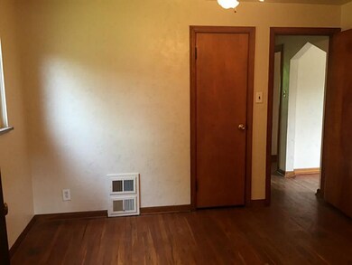 Bedroom. Gleaming hardwood floors!