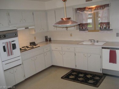 Large EAT-IN KITCHEN with plenty of cabinets and c