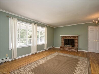 Living Room W/ Wood Burning Fireplace