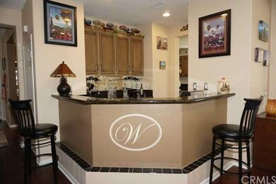 Fabulous walk-in wet bar with granite counters.