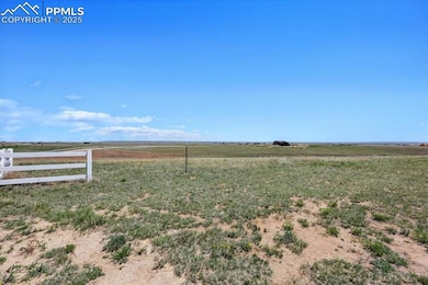 View of yard featuring a view of countryside and fence