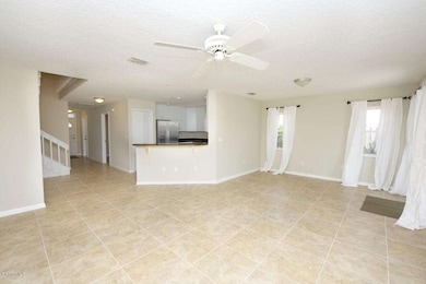 Palm Living Room Open to Kitchen