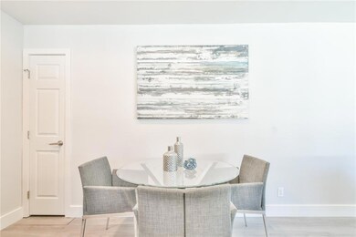 Dining room with light hardwood / wood-style floor