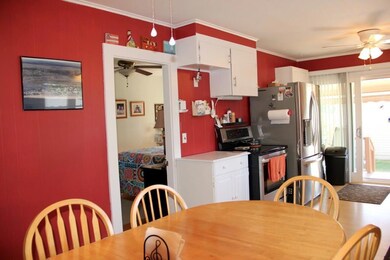 Kitchen has a slider out the back deck.