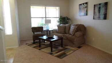 Living room with foyer on left