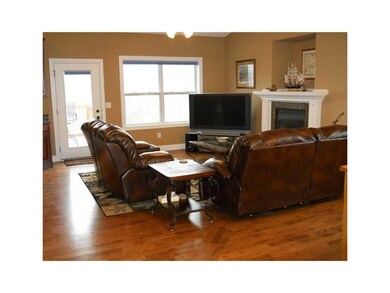 Interior Space/Layout. Warm wood, and rugged grani