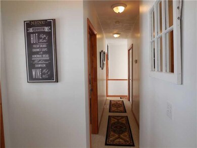 Other. Hallway with Main Floor Laundry on Right.