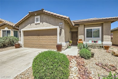 View of front of house with an attached garage, st