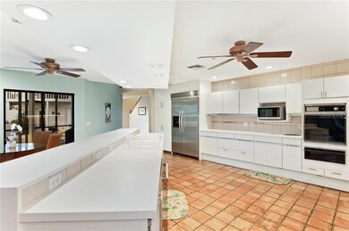 View from kitchen to one of multiple outdoor lanai