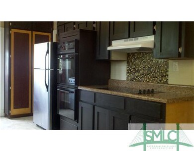 Kitchen. Galley Kitchen is Roomy and Features Tons