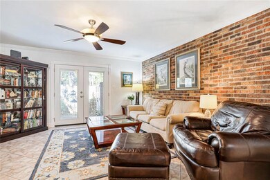 Living room with brick accent wall