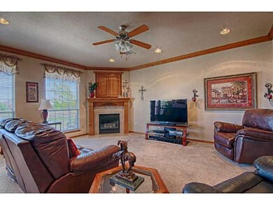 Living Room. The living room has a fireplace, ceil