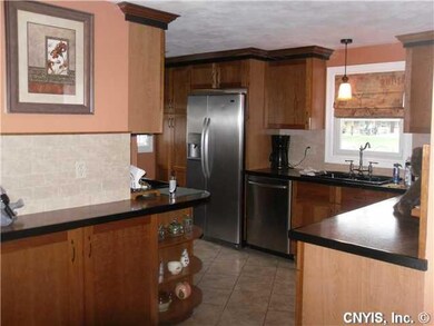 Kitchen. New kitchen includes Kraftmaid Cherry cab