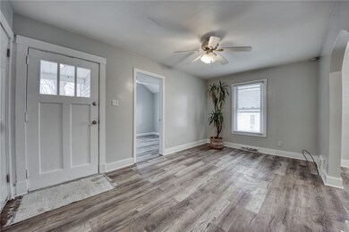 16x10 living room features durable vinyl flooring