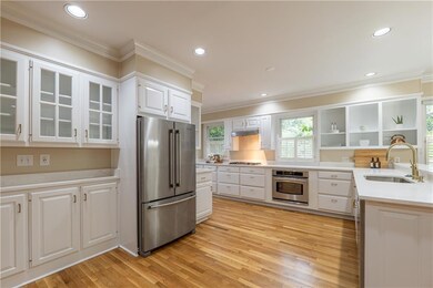 Generous pantry space, coffee bar, and abundant cabinet are just some of the amazing kitchen bonuses.