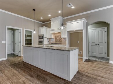 Kitchen featuring appliances with stainless steel 