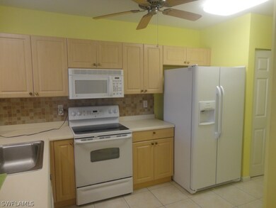 Kitchen features tile backspash