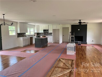 Kitchen open to living & dining area