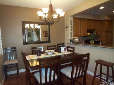 Dining room features a beautiful chandelier; adjac