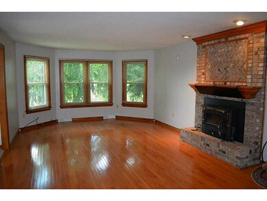 Family Room. Gorgeous hardwood floors and bay wind