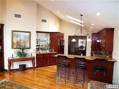 The bar between the great room and kitchen