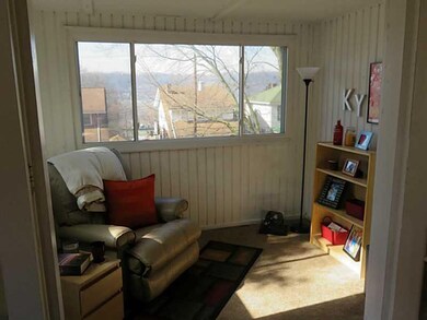 Sunroom. Sun room off the living room. Shut french