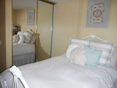 2nd bedroom features mirrored wardrobe