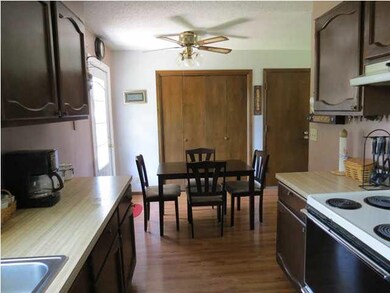 Kitchen / Dining area has new wood floor
