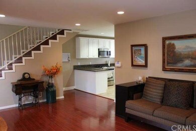 (1st Floor) Living Room opens to gorgeous Kitchen