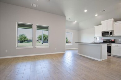 Kitchen featuring appliances with stainless steel 