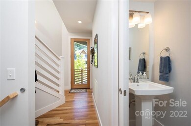 Efficient Design Includes Powder Room and Coat Closet at Entry
