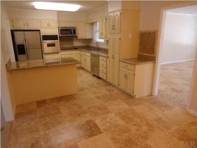 HUGE Kitchen. Travertine Tile, Granite Countertops, undermount higher grade sinks, New Stainless Steel Whirlpool appliances