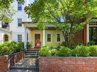 Enjoy the parade of daily life from a comfortable setback.