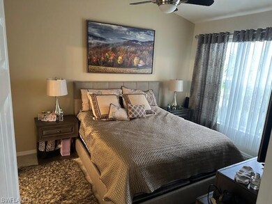Bedroom featuring baseboards and ceiling fan