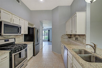 Another view of the kitchen showcasing the natural