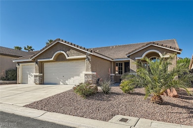 Single story home with an attached garage, stucco