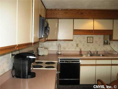 Kitchen. Kitchen is large with room for a table.