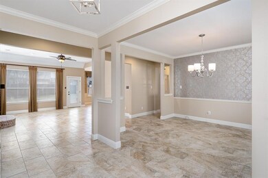 Looking from entry way into dining room and living