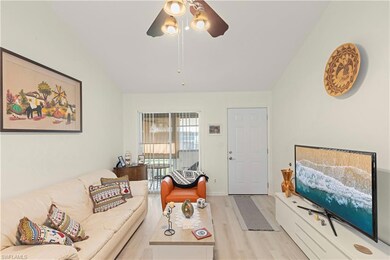 Living room featuring light wood-type flooring, va