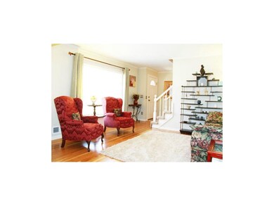 Living Room with beautiful hardwoods and natural l