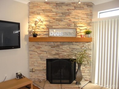 CUSTOM STONE WOODBURNING FIREPLACE