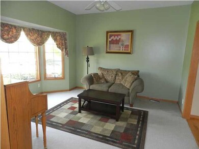 The Formal Living Room Provides Large Windows to E