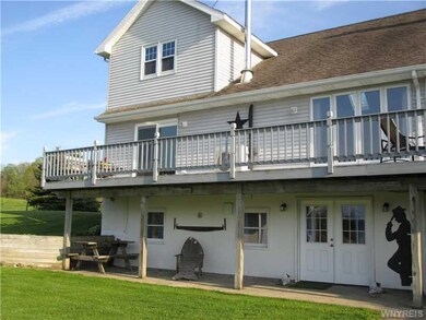 Backyard. Wrap round deck & lower walk-out Patio.