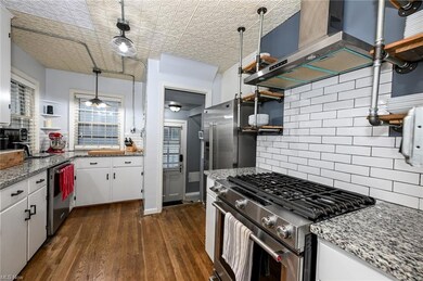 Kitchen featuring appliances with stainless steel 