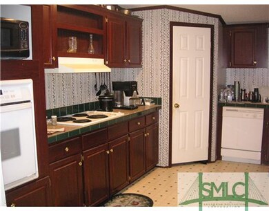 Kitchen. HUGE kitchen that has enough room to put 