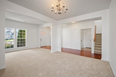 View from formal dining room into living room and
