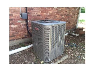 Other. Lennox AC located on side of home