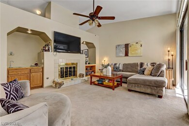 Open living room with ceiling fans